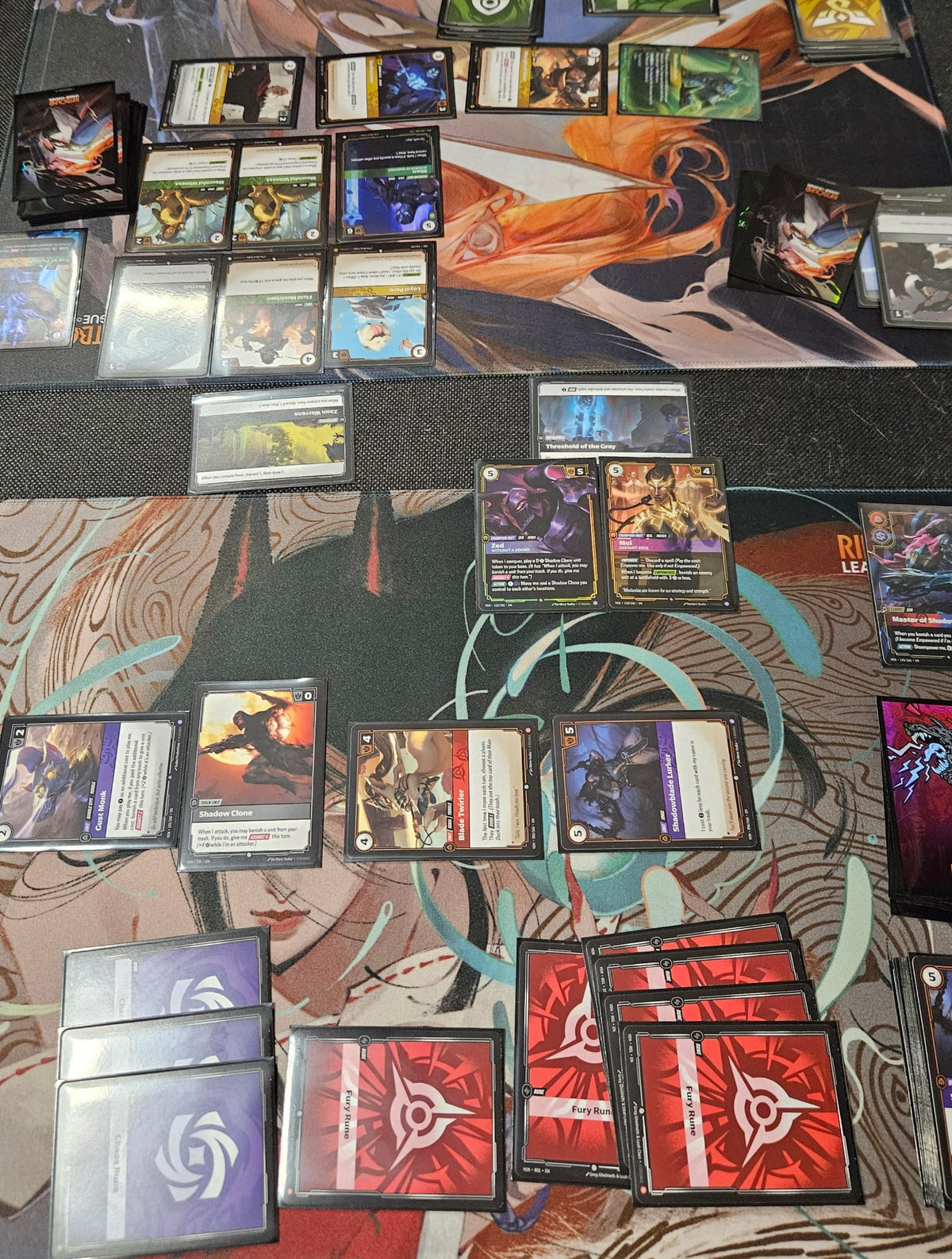 Riftbound League of Legends TCG gameplay – real tabletop match showing cards and battlefields